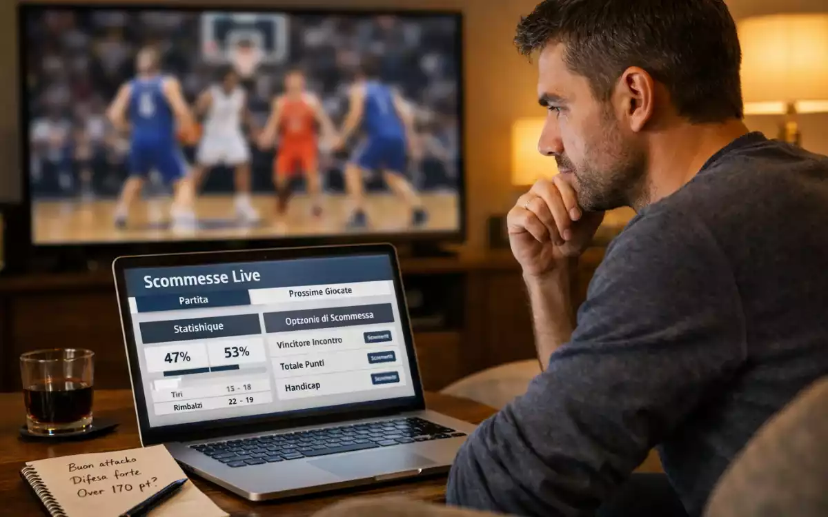 Appassionato che analizza la partita mentre scommette